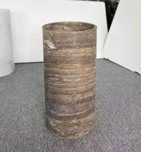 Cylindrical vessel in brown travertine with strong horizontal veining