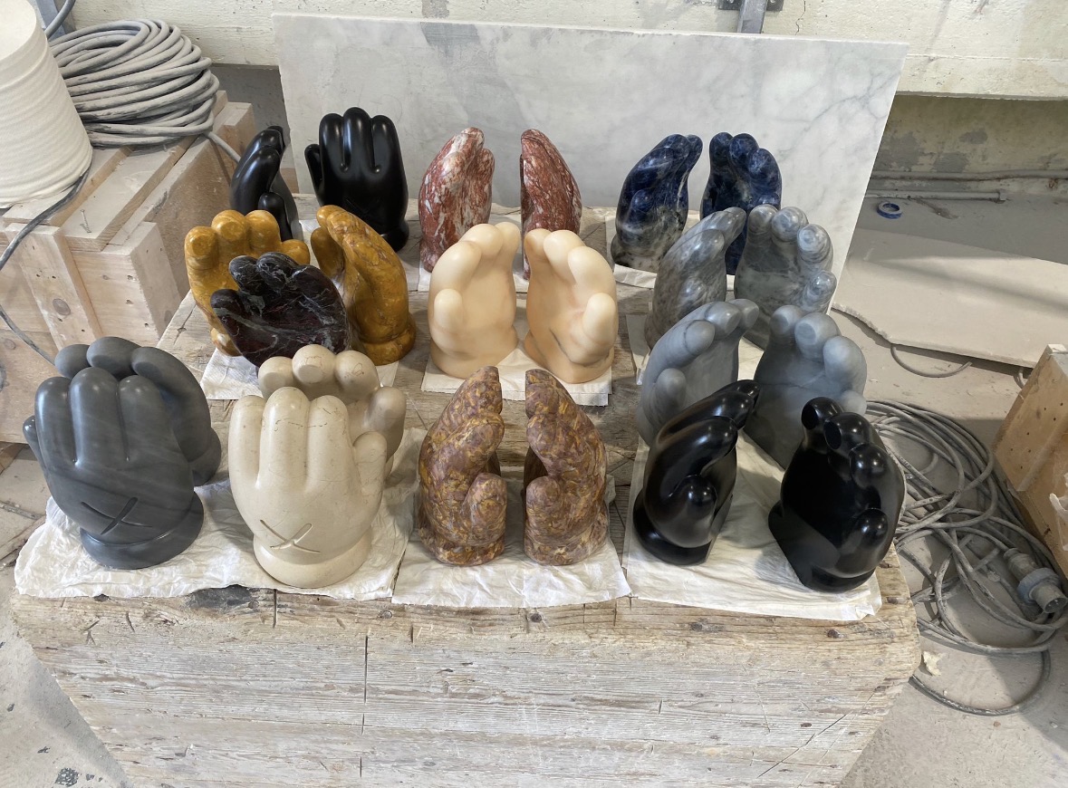 The Petra Cortright x Gerets hand series — carved hands in many marble varieties